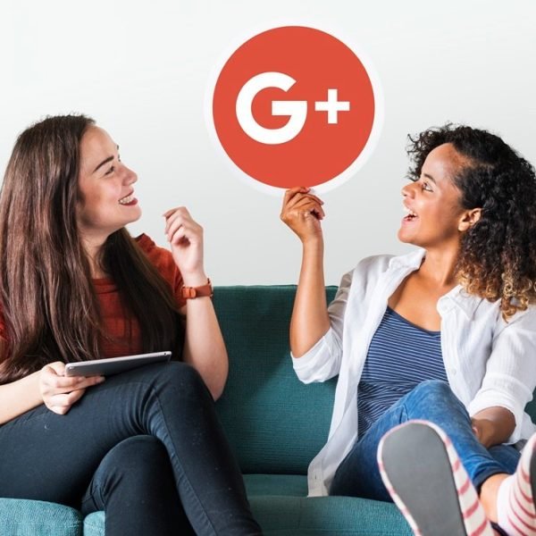 Women holding a Google Plus icon